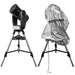 Celestron Weatherproof Telescope Cover draped over a mounted telescope outdoors, showing full-length protection from optical tube to tripod legs.
